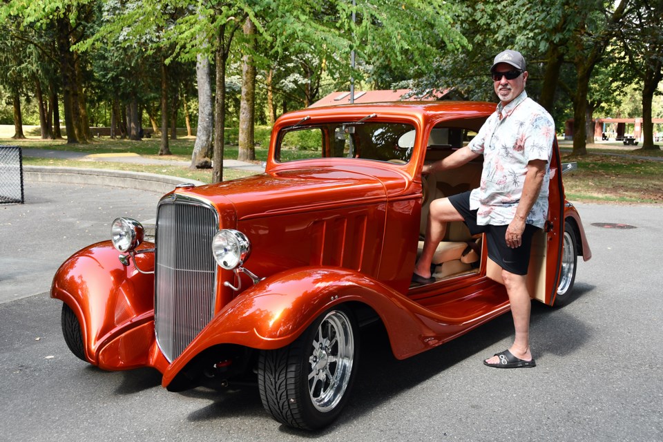 Coquitlam-born, Burnaby-raised Rick Marchand with his 1933 Chevrolet five-window Coupe, at Lions Park in Port Coquitlam on Aug. 14, 2024.