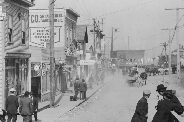 https://www.vmcdn.ca/f/files/tricitynews/images/buildings/busy-port-coquitlam-at-the-turn-of-the-century.png;w=766;h=507;mode=crop