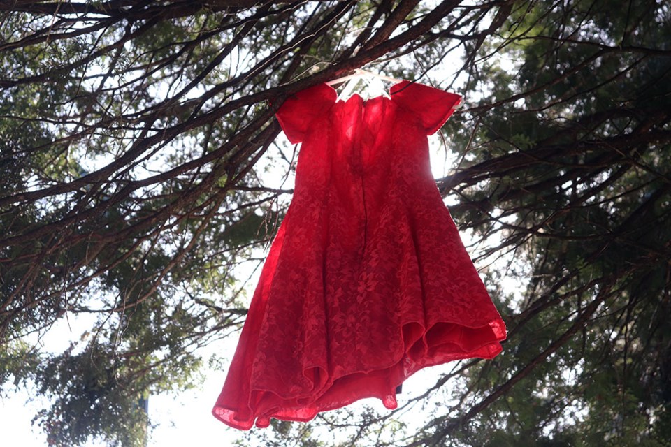 Red dresses displayed near Coquitlam school in standing with MMIWG2S ...