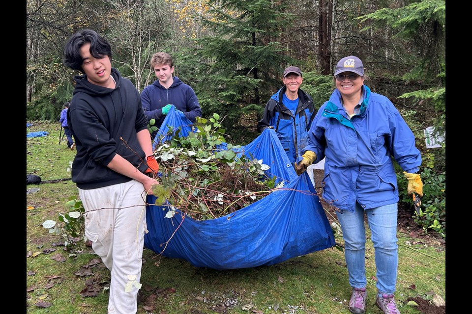 Volunteers from the Lower Mainland Green Team rmove more than nine cubic metres of invasive plant species from Seaview Park in Port Moody.