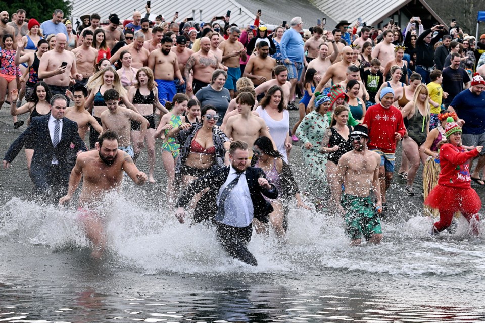 Photos: Revellers plunge into the New Year (and Burrard Inlet) - Tri-City  News