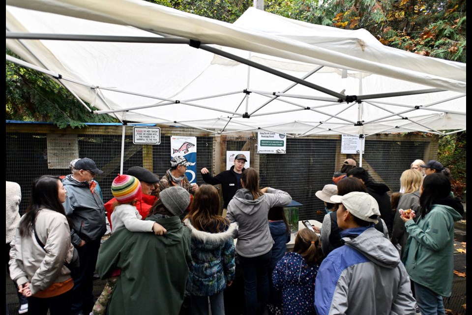 Matthew Watts, director at the Hoy–Scott Creek Watershed Society speaks to the crowd.