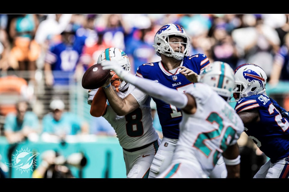 Miami Dolphins safety Jevon Holland (8) defends during an NFL