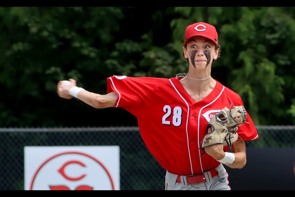 Coquitlam Reds shortstop Jacob Bergot fires a throw to first in their second round game against the Langley Blaze at the BC Premier Baseball League junior provincial championships, Friday at Mundy Park.