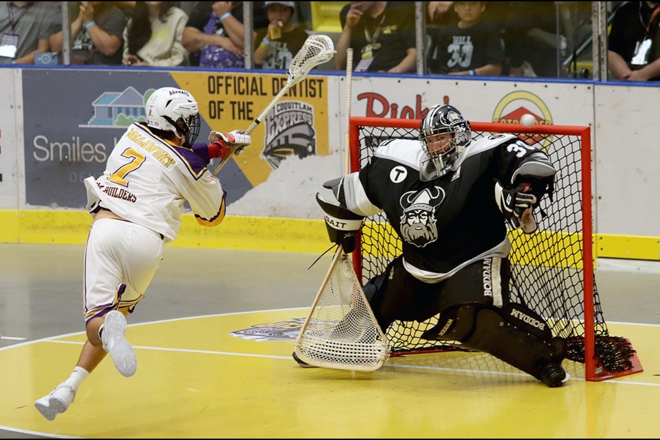 Orangeville Northmen goalie Lindyn Hill denies Coquitlam Jr. Adanacs forward Cody Malawsky on a scoring attempt in the first period of their round-robin game at the Minto Cup national junior lacrosse championships, Monday at the Poirier Sport and Leisure Complex.