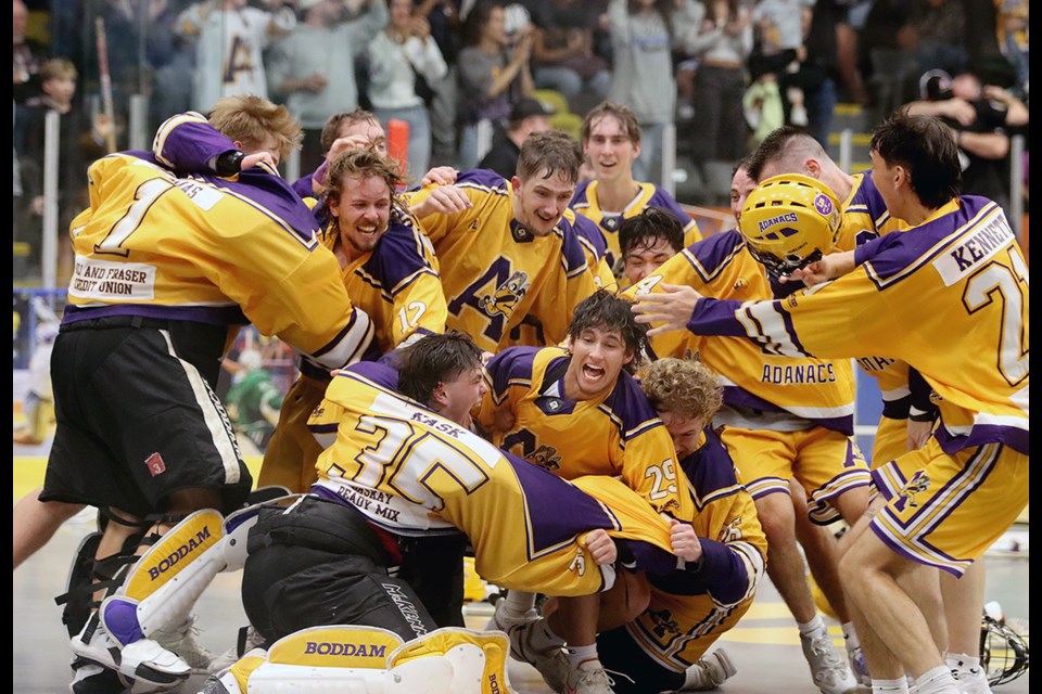 The Coquitlam Adanacs celebrate winning the 2024 Minto Cup junior national lacrosse championship after beating the Orangeville Northmen 9-6 on Friday to sweep their best-of-three final in two straight games.