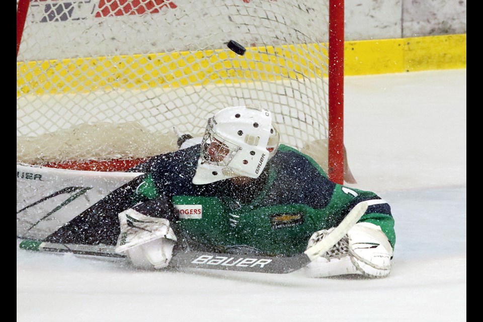 Surrey Eagles goalie Maddox Osaka is beaten for the first goal by Nick Wellenreiter of the Coquitlam Express in their BC Hockey League game, Wednesday afternoon at the Poirier Sport and Leisure Complex.