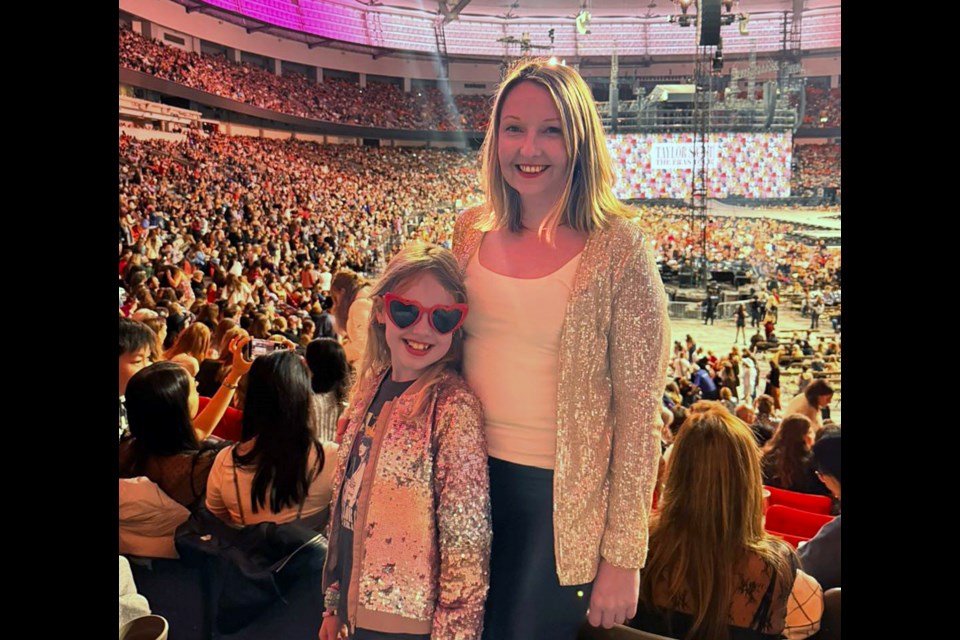 Kylie Wright, and her daughter, Saoirse, at Sunday's Taylor Swift concert after they won tickets at a Coquitlam Express game earlier in the day.