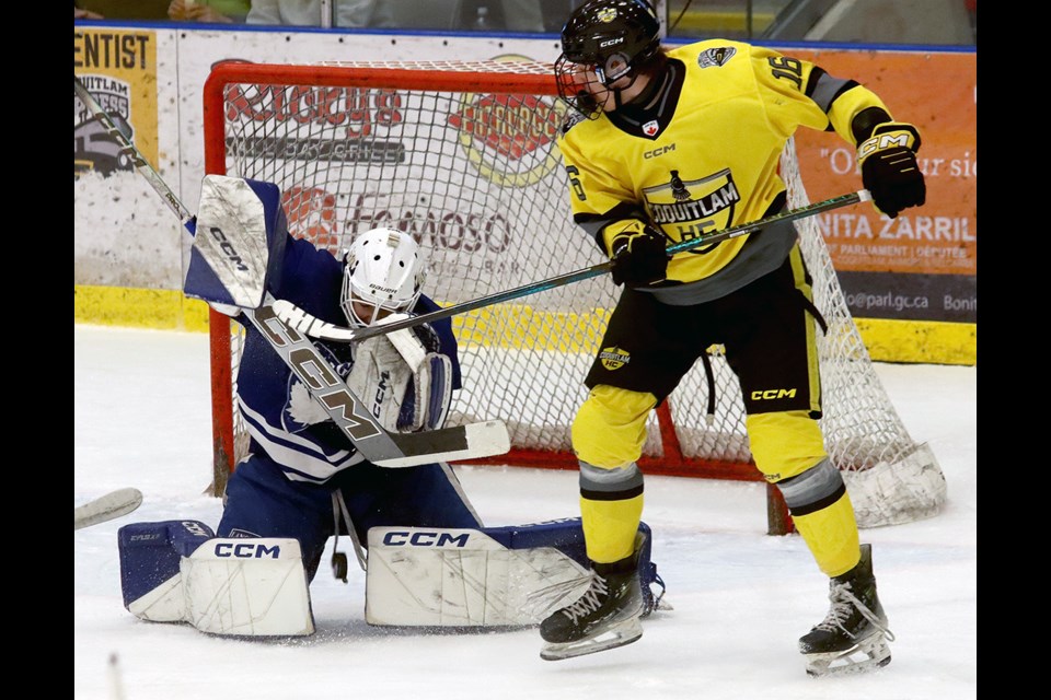 Langley Hockey Academy goalie Colton Bush stops a deflection by Coquitlam HC forward Ryder Riedel in the first period of their Junior Prospects Hockey League U18 game, Wednesday afternoon at the Poirier Sport and Leisure Academy. Langley won, 8-3.