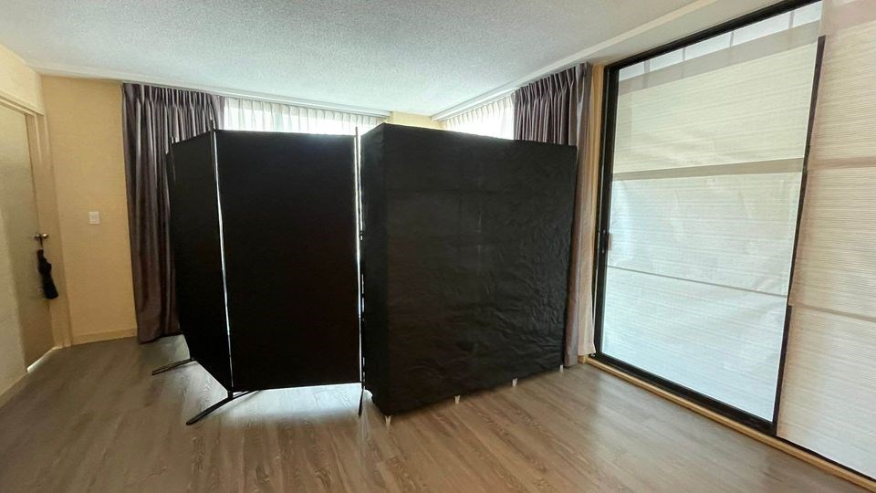 The sleeping space being offered for $800 per month in Vancouver is a corner of the living room.