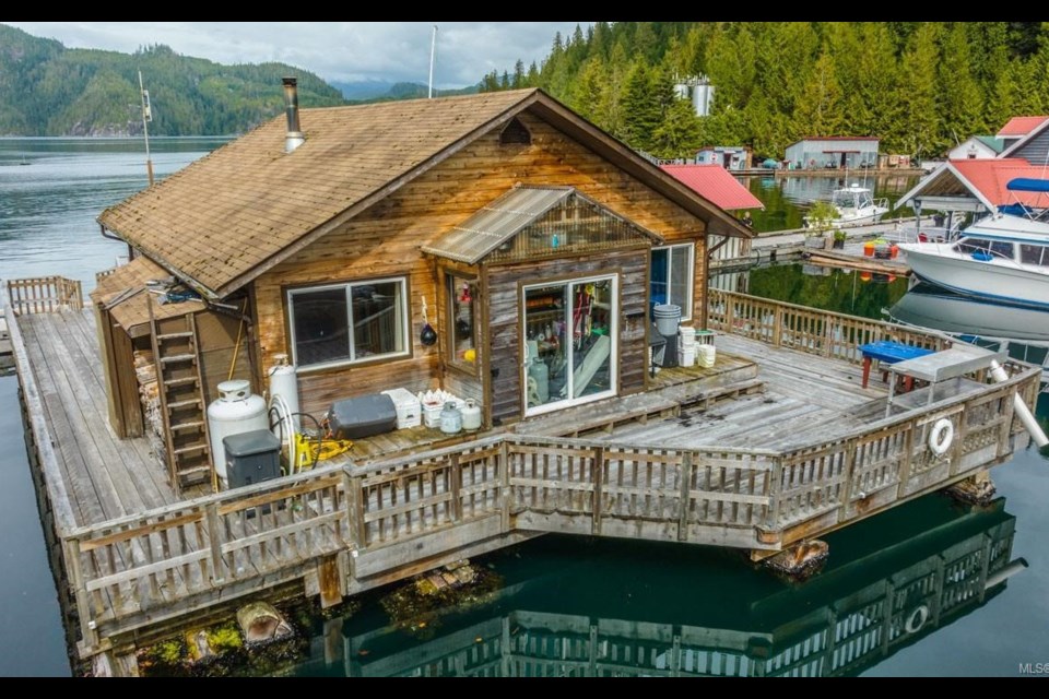 This little floating home in Sullivan Bay off saʴý's North Broughton Island is on the market for under $300K.