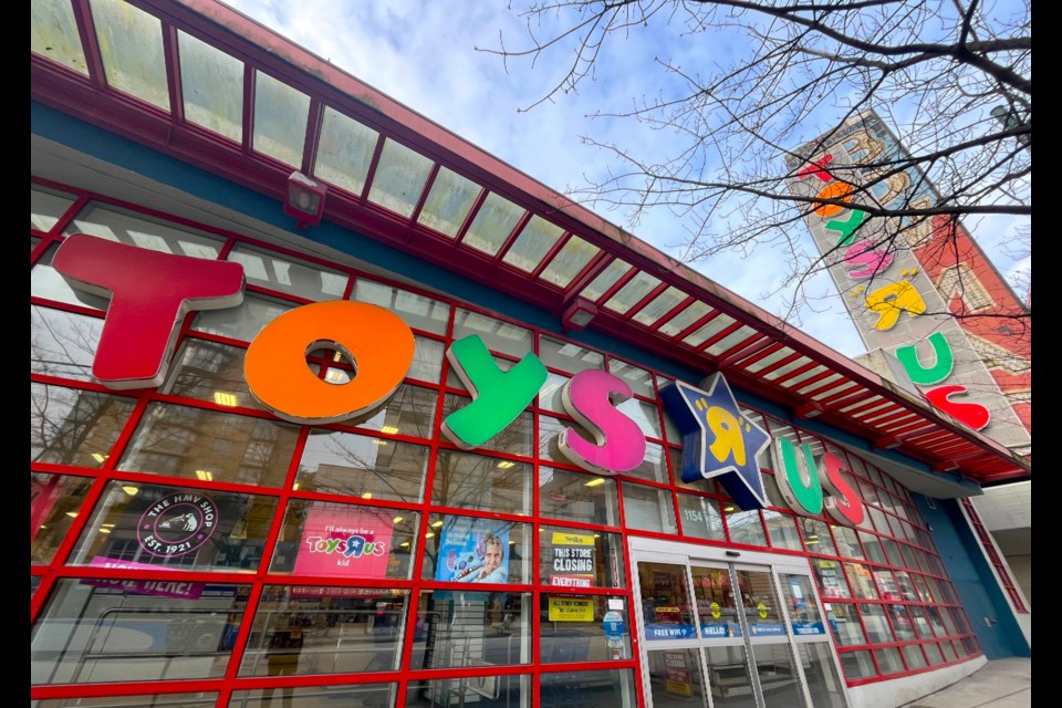 The Toys "R" Us on Broadway in Vancouver will be closing soon. What will become of the well-known vertical and formerly neon Bowmac sign currently viewable beneath the retailer's name remains unknown.