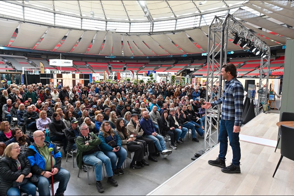 HGTV host Scott McGillivray speaks to the crowd at the BC Home + Garden Show. The 2025 edition of the annual event runs March 13 to 16 at BC Place in Vancouver.