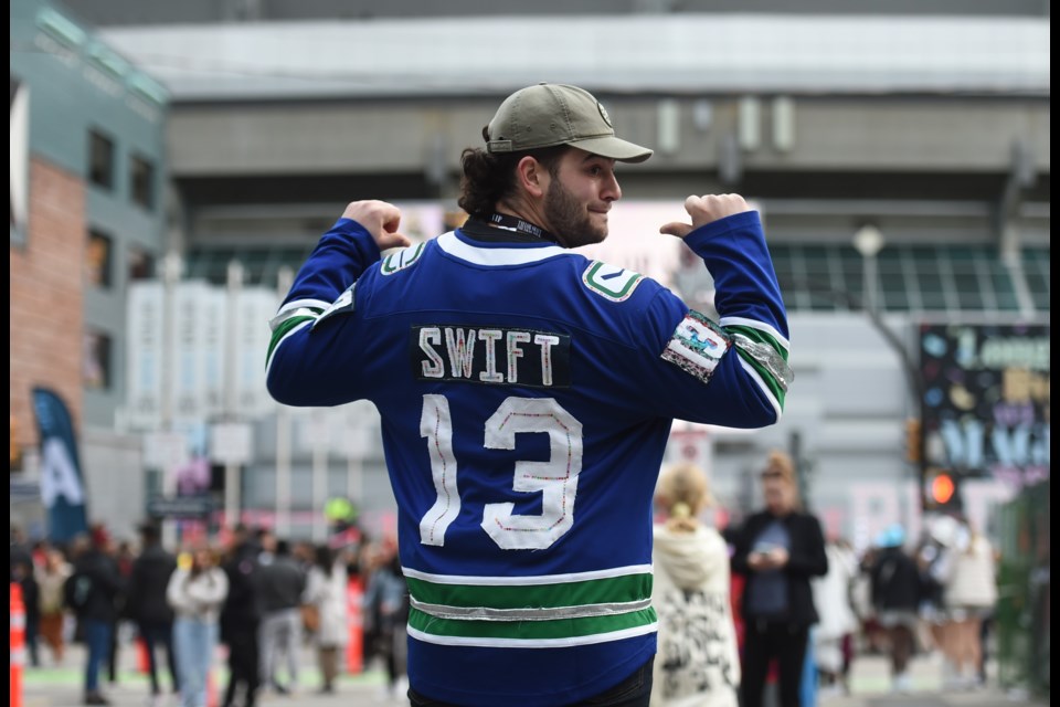 Sandro Corea of Vancouver hand-bedazzled his own Canucks/Swift jersey.