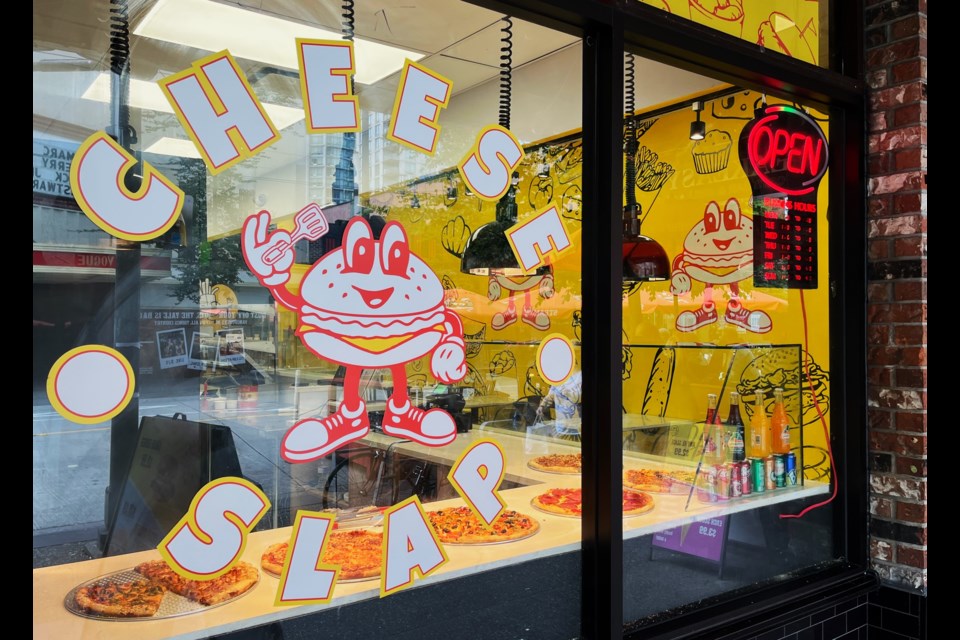 Cheese Slap has opened up on the Granville Strip, offering food like pizza and burgers.