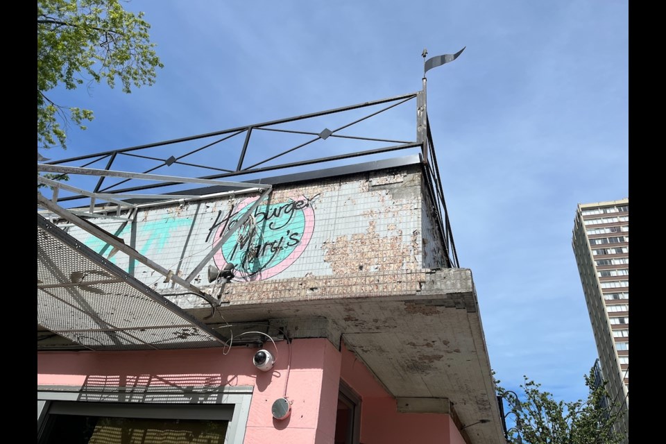 A very old Hamburger Mary's sign was revealed on the facade of the restaurant at 1202 Davie St in the West End after longtime awnings were brought down this month.