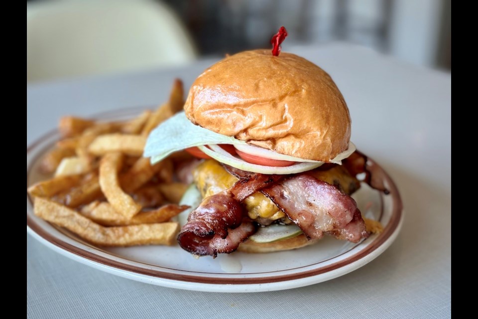 Burgers are the star of the show on The Red Wagon's new dinner menu, including the Bacon Cheddar burger. Other options include a Fried Pickle Burger (with two massive fried spears), a smashburger, and the restaurant's decadent Bistro Burger