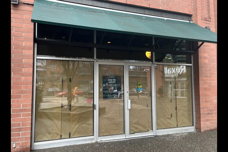 A sign on the Starbucks says the downtown Vancouver location has closed permanently.