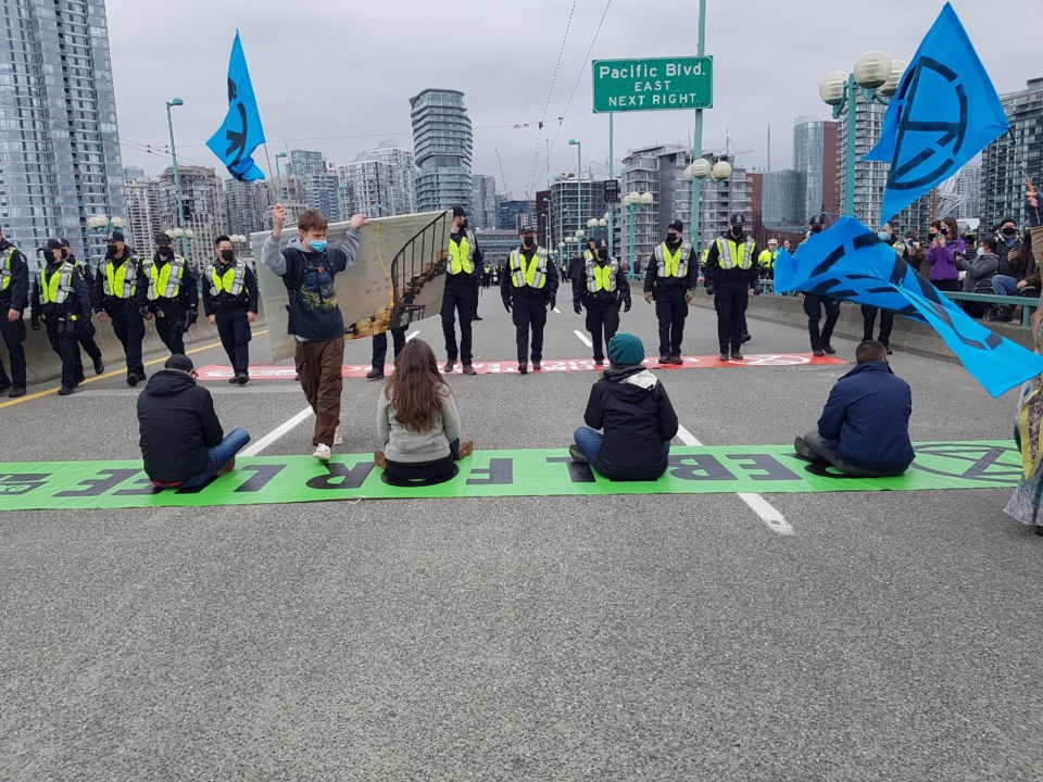 extinction rebellion cambie bridge protest arrests - Vancouver BC - Saturday, March 27