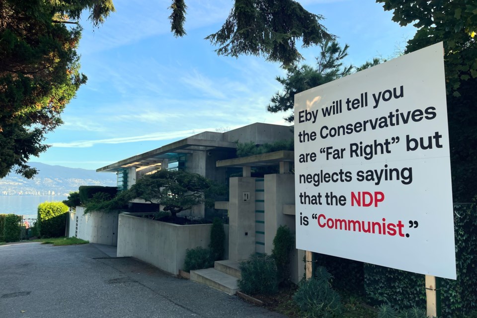 A sign at Chip Wilson's Point Grey property, the most expensive house in B.C., implies the BC NDP party is communist.