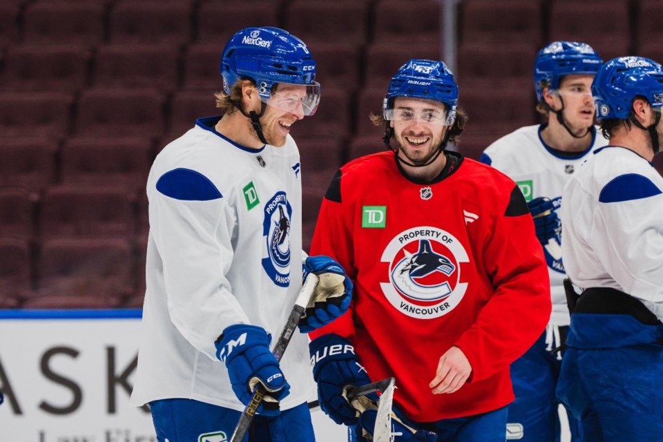 boeser-hughes-canucks-practice-canucks-twitter