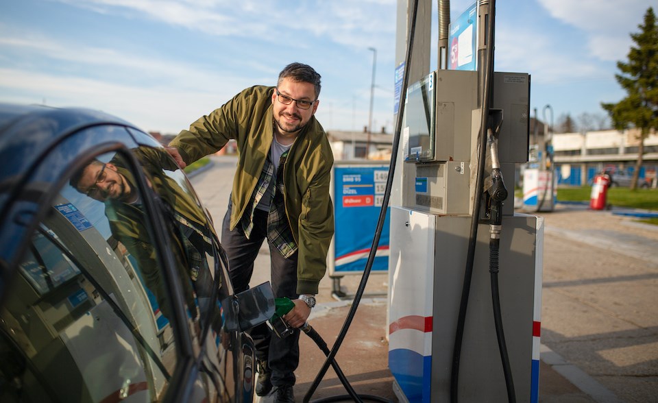 man-refueling-gas-at-station