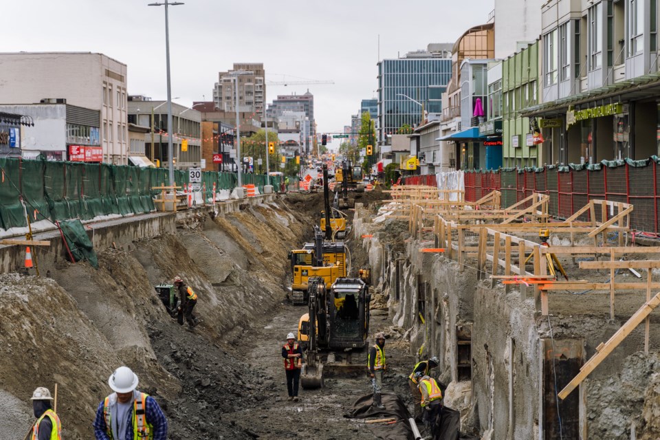 In many places the project began with a trench dug on Broadway to install the street panels which traffic can travel on while the tunnel is built below (May 26, 2022).