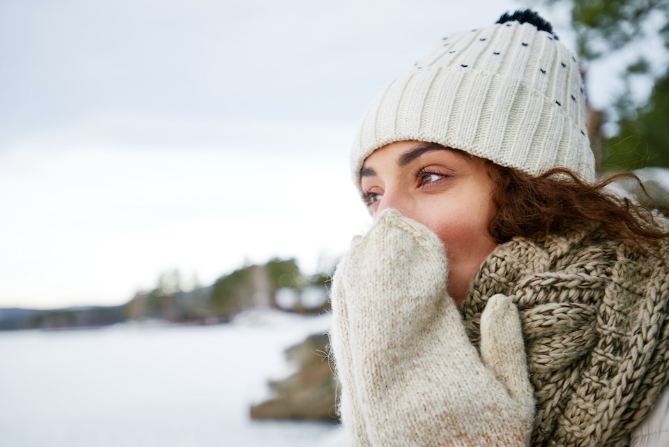 vancouver-weather-2025-person-looking-cold-bundled-up