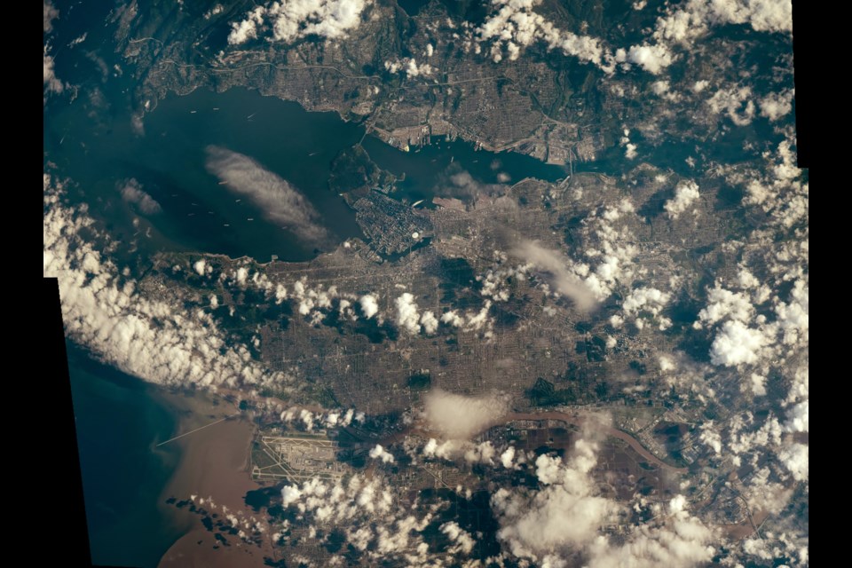 Astronaut Thomas Pesquet shared this collage of images of Vancouver from space in 2021, with clouds casting shadows across parts of the city.