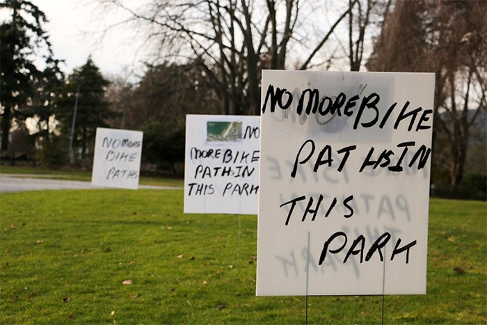  Residents opposed to the proposed Kits Beach Park bike path rallied outside the Vancouver Park Board office Monday. Commissioners later passed a motion to refer the proposal back to staff for more information. Photo Saša Laki?