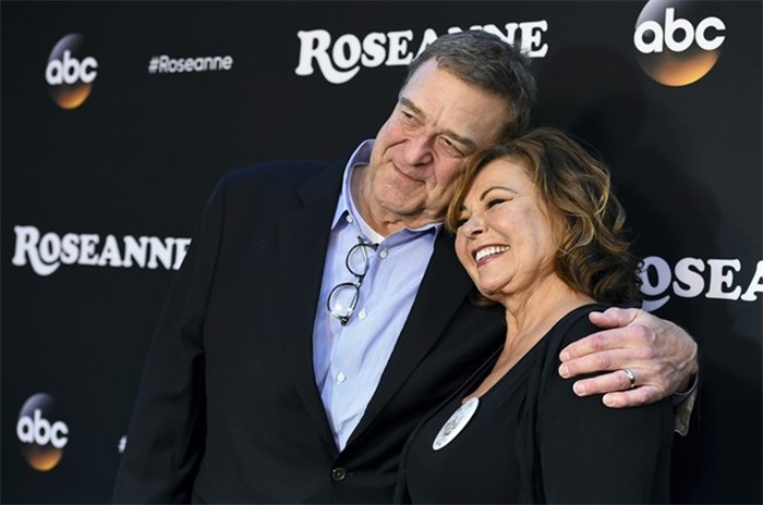  FILE - In this March 23, 2018 file photo, John Goodman, left, and Roseanne Barr arrive at the Los Angeles premiere of 