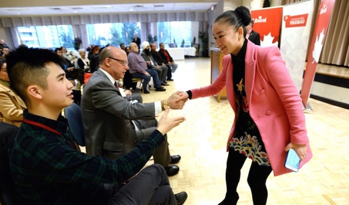  Karen Wang shakes hands with Burnaby South Liberal supporters. Photo by Jennifer Gauthier.