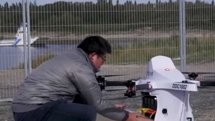  A Drone Delivery Canada drone is loaded before it flies to the community of Moose Factory, Ontario. Photo Drone Delivery Canada