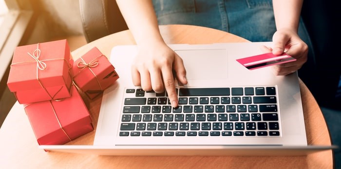  Metro Vancouver residents are being warned about an online pyramid scheme that promises you'll get thousands of dollars. Photo: Using a credit card online/Shutterstock