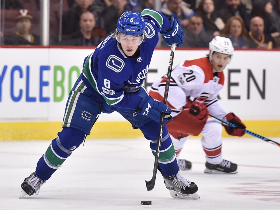 Brock Boeser with the puck