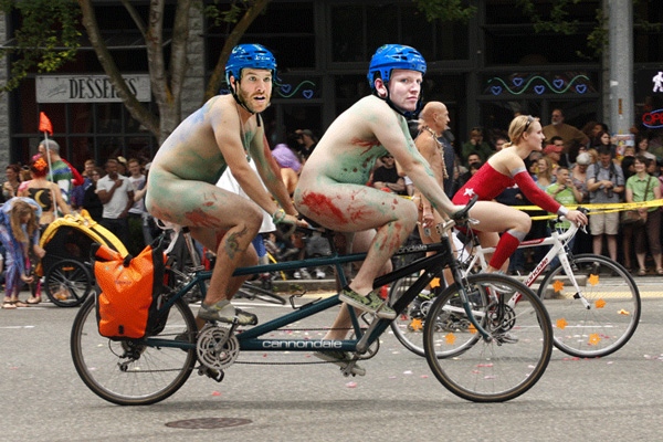 Dorsett and Prust on a tandem