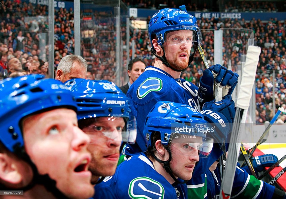 Henrik Sedin stands