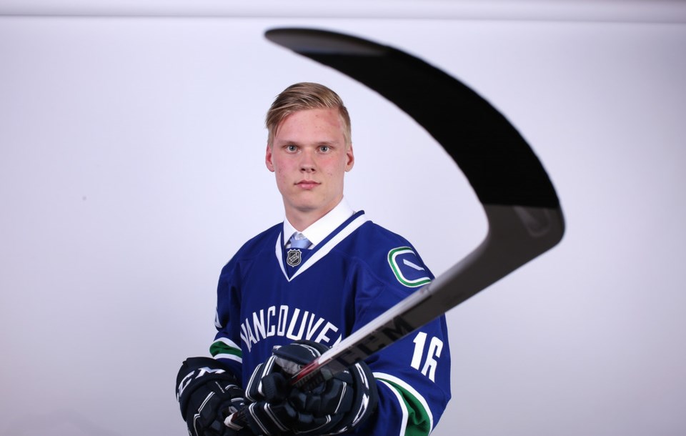 Olli Juolevi points a stick like a top-pairing defenceman.