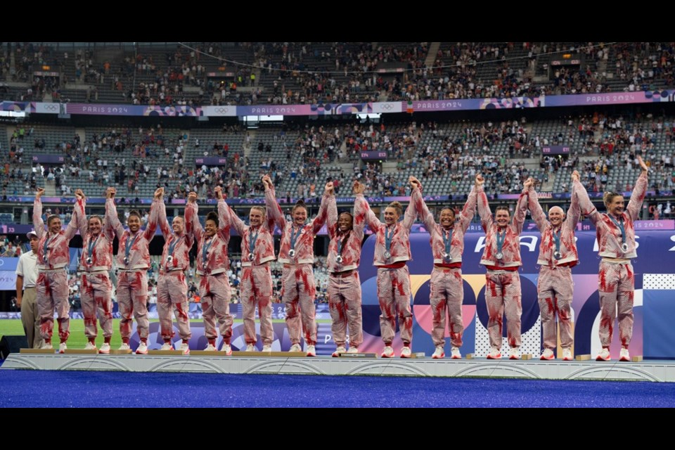 saʴý's women's rugby seven's team stands on the podium after winning silver in competition at the Summer Olympics in Paris, Monday, July 29, 2024. THE CANADIAN PRESS/Adrian Wyld