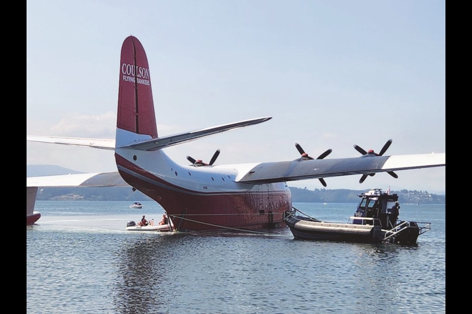 Hawaii Martin Mars was moved from the waters of Patricia Bay onto land on Wednesday, Aug. 14, 2024. COLDWATER DIVERS