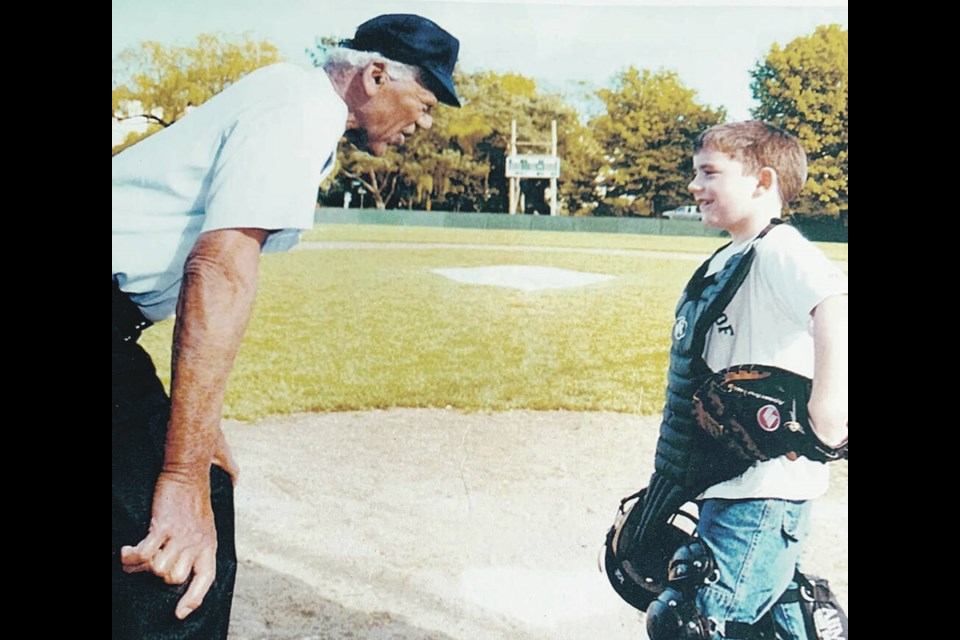 Umpire Doug Hudlin lays down the rules.   COURTESY OF FAMILY