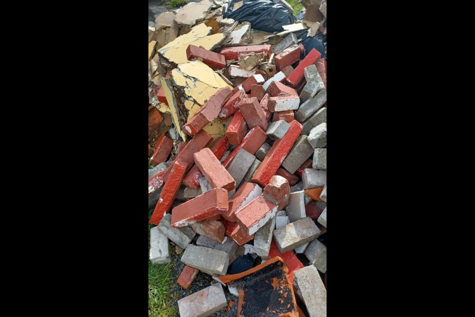 Construction debris dumped along Highway 17.CENTRAL SAANICH POLICE VIA FACEBOOK 