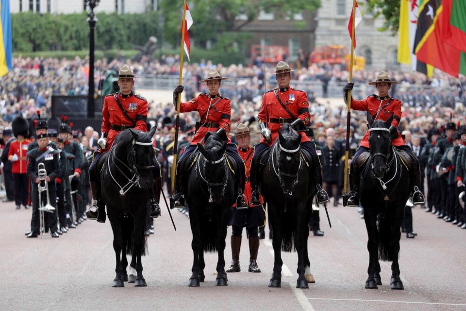 The procession starts for Queen Elizabeth II's funeral, in London, Monday, Sept. 19, 2022. (Marko Djurica/Pool Photo via AP)