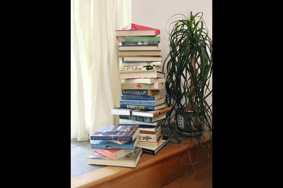 Monique Keiran's summer-reading book pile. VIA MONIQUE KEIRAN  