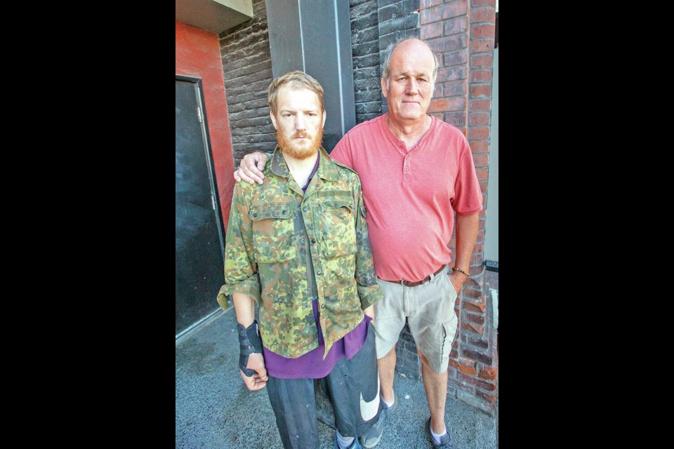 David Jenvey with son Joe Jenvey, who has been in and out of treatment for his fentanyl addiction. He has overdosed 10 times, been on life support twice, but never seems to hit rock bottom.  DARREN STONE, TIMES COLONIST 