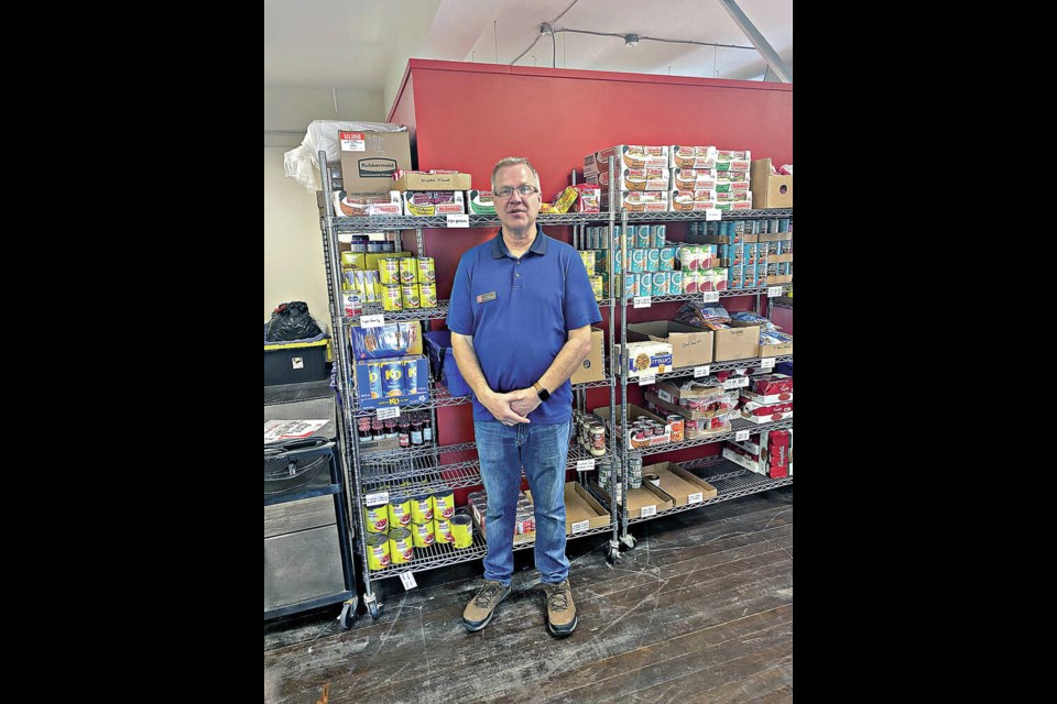 Community-ministry director Pat Humble at the food bank that runs out of the Salvation Army family-services resource centre in Vic West. TIMES COLONIST 