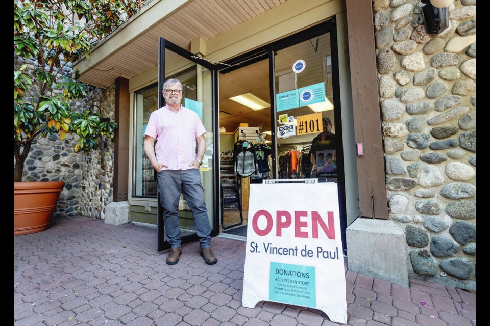 Executive director Derek Pace opens the doors to the St. Vincent de Paul Thrift Store that has moved into a space in Langford City Hall. The Langford thrift shop was forced to close its previous site after the apartment ­building next door was evacuated last month due to ongoing safety concerns. DARREN STONE, TIMES COLONIST 