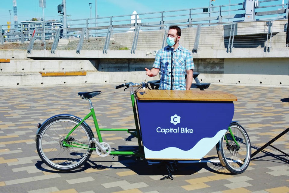 Capital Bike executive director Adam Krupper with the cargo bike at the launch of Capital Bike in 2021. VIA CAPITAL BIKE  