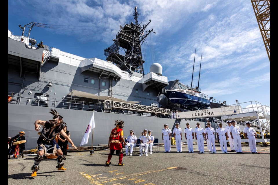 Lekwungen traditional dancers perform during ceremonies beside Japanese Ship Kashima of the Japan Maritime Self-Defense Force, docked at CFB Esquimalt on Thursday, June 15. DARREN STONE, TIMES COLONIST 