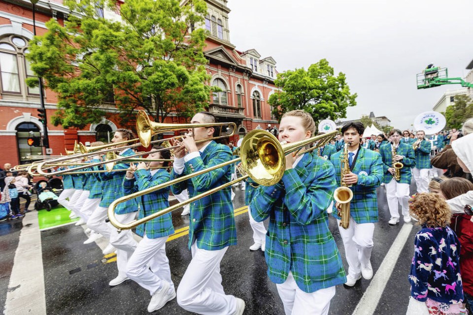 The Reynolds Secondary School Marching Band performs in the Victoria Day Parade. Participation in team-based activities like band yields a range of well-documented advantages, both mental and physical, writes Geoff Johnson. DARREN STONE, TIMES COLONIST 